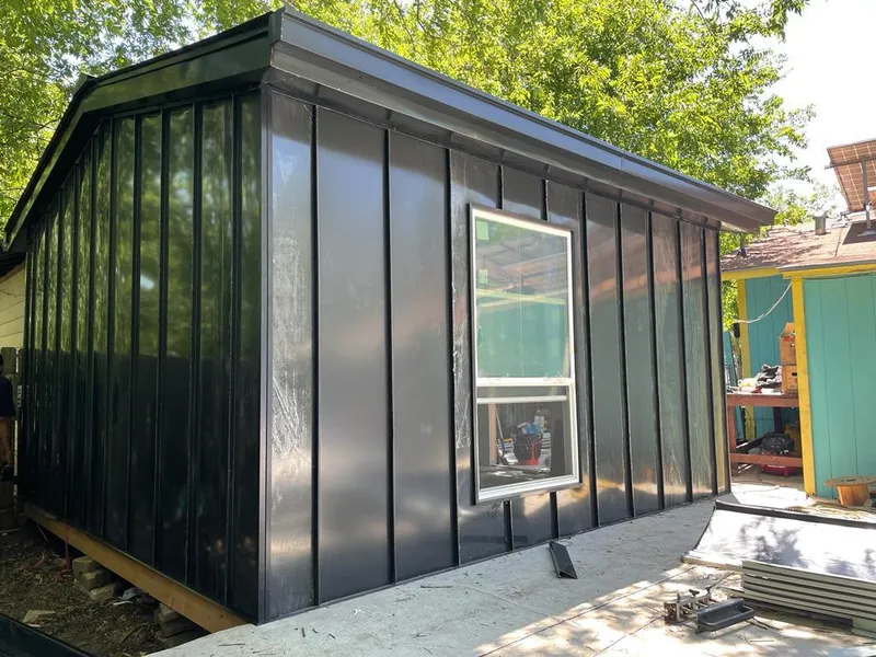 Black standing seam metal wall panels for Metal Roof Installation in East Greenbush