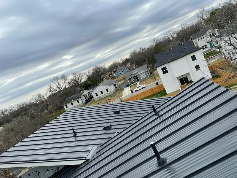 Standing seam metal roof panels with vents for Skylight Repair in East Greenbush